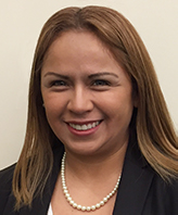 Photo of Maribel smiling.